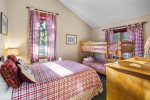 Mammoth Condo Rental Meadow Ridge 24: Third bedroom with a bunk bed, queen bed, closet, dresser